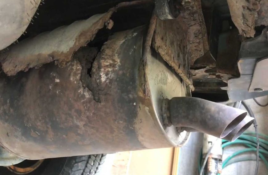 Replace a cracked or rusted muffler with a junkyard one